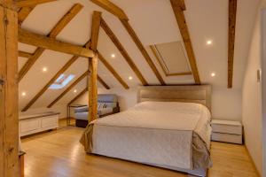 Un pat sau paturi într-o cameră la Kotor old town Palace Bucha