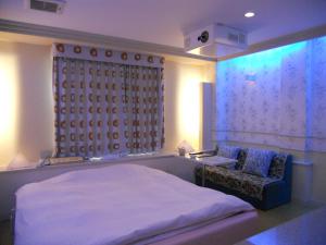 Cama ou camas em um quarto em Hotel Mare (Adult Only)