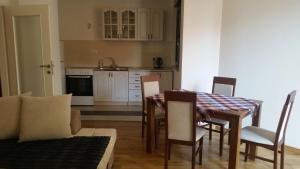 Kuchyň nebo kuchyňský kout v ubytování M&M Apartman 2