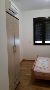 Postel nebo postele na pokoji v ubytování M&M Apartman 2