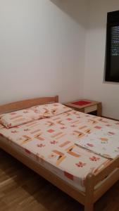 Postel nebo postele na pokoji v ubytování M&M Apartman 2