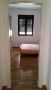 Postel nebo postele na pokoji v ubytování M&M Apartman 2
