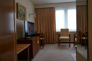 TV i/ili multimedijalni sistem u objektu Hotel Terminus Brugg