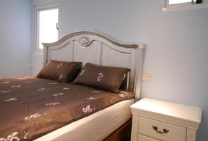 Letto o letti in una camera di Chi Chi B&B