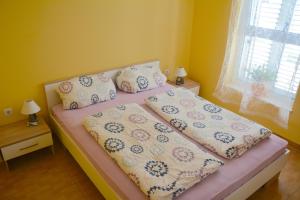 Postel nebo postele na pokoji v ubytování Apartments Viola Superior