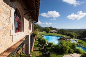 A view of the pool at Hotel Termal Abadia de Los Templarios or nearby