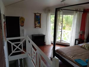 Postel nebo postele na pokoji v ubytování Villa Caraîbes