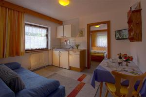 Kuchyň nebo kuchyňský kout v ubytování Gasthof Pension Granstein