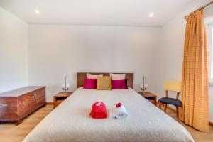 Ένα ή περισσότερα κρεβάτια σε δωμάτιο στο Cosmopolis