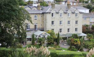 an aerial view of a large building with a garden at The Royal Hotel in Ventnor