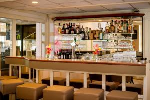 El salón o zona de bar de Campanile Hotel & Restaurant Gouda
