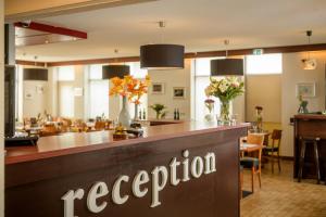 Lobbyen eller receptionen på Campanile Hotel & Restaurant Venlo