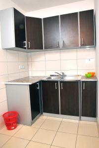 Kuchyň nebo kuchyňský kout v ubytování Hostel Room