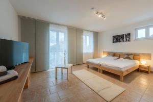 Postel nebo postele na pokoji v ubytování WN Rooms
