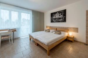 Postel nebo postele na pokoji v ubytování WN Rooms