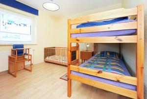 Ένα ή περισσότερα κρεβάτια σε δωμάτιο στο Ferienwohnung Achterloog
