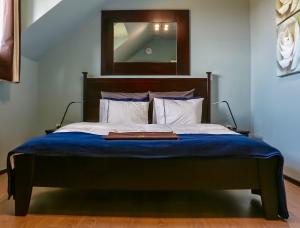 Postel nebo postele na pokoji v ubytování Merci Hotel
