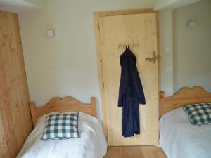 A bed or beds in a room at Chalet Etoile