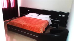 Voodi või voodid majutusasutuse Hotel Alpet toas