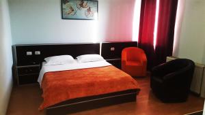 Voodi või voodid majutusasutuse Hotel Alpet toas