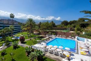an aerial view of a resort with a swimming pool at TRH Taoro Garden - Only Adults in Puerto de la Cruz