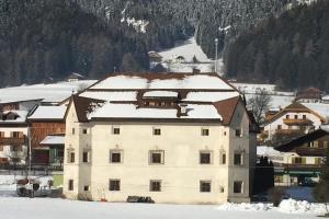 Mansarda Dolomiti v zimě