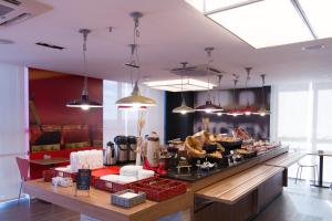 Reštaurácia alebo iné gastronomické zariadenie v ubytovaní ibis Passo Fundo Centro