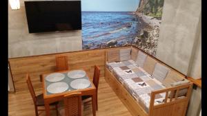 TV a/nebo společenská místnost v ubytování NavyBlue Apartments