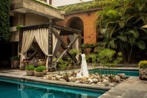 Bazén v ubytování NEhotel Nueva Estancia nebo v jeho okolí