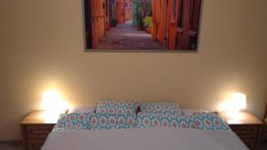 Posteľ alebo postele v izbe v ubytovaní Apartament Raz Dwa Trzy