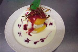 a dessert on a white plate on a table at Lairg Highland Hotel in Lairg