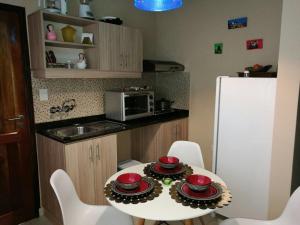 Virtuve vai virtuves zona naktsmītnē Mandala Apartments