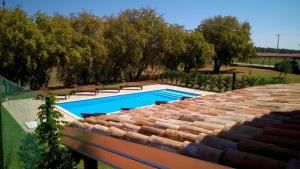 an image of a swimming pool on top of a roof at Holiday Home Old Barn in Umag