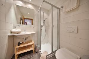 Koupelna v ubytování Hotel Garni Fiegl Apart