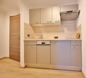 Kuchyň nebo kuchyňský kout v ubytování Hotel Garni Fiegl Apart