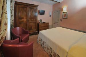 Posteľ alebo postele v izbe v ubytovaní Agriturismo La Sovana