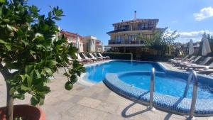 Bazén v ubytování Family Hotel Muses nebo v jeho okolí