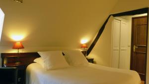 Posteľ alebo postele v izbe v ubytovaní Le Pave d'Hotes