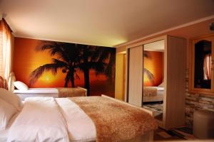 Ένα ή περισσότερα κρεβάτια σε δωμάτιο στο Hotel Harmony +82 φωτογραφίες