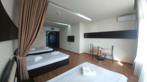 Voodi või voodid majutusasutuse Cross Health Spa Center toas