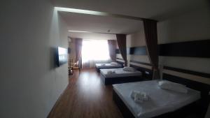 Voodi või voodid majutusasutuse Cross Health Spa Center toas