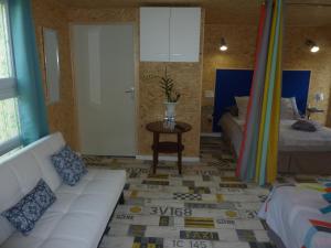 Postel nebo postele na pokoji v ubytování Le patio d'Eric B&B