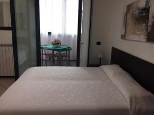 A bed or beds in a room at Residenza S.Event B&B