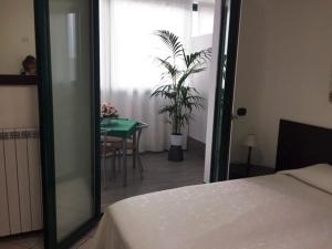 A bed or beds in a room at Residenza S.Event B&B