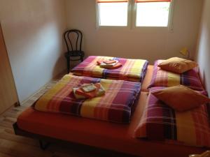 Uma cama ou camas num quarto em Casa Aurora
