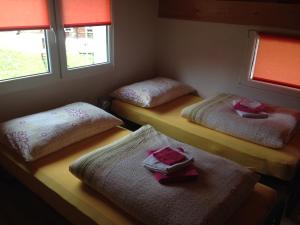 Postel nebo postele na pokoji v ubytování Casa Aurora