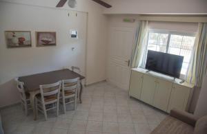 A television and/or entertainment centre at Villa Riza