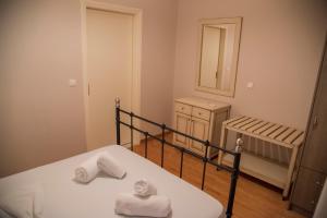 A bed or beds in a room at Villa Riza