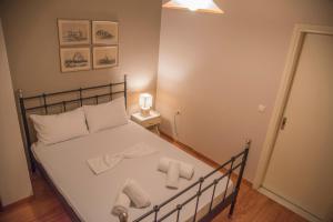 A bed or beds in a room at Villa Riza