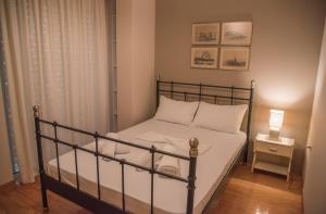 A bed or beds in a room at Villa Riza